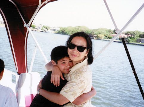 Terry and her son Brian on a boat
