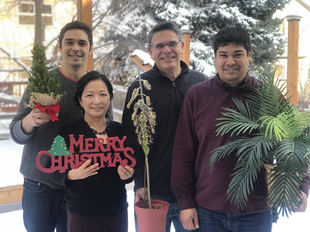Terry, Brian, and their sons Brian and Tim at Christmas, 2019